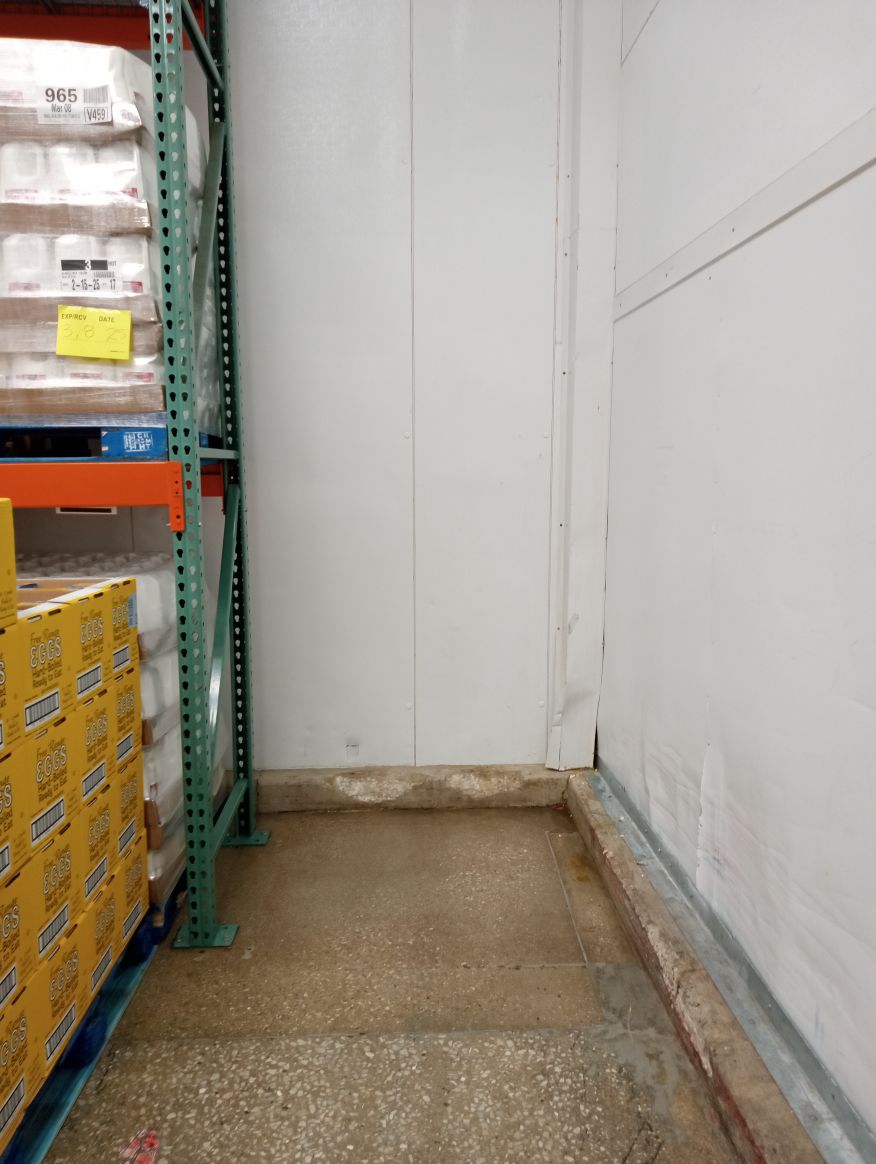 Image of empty shelves in warehouse